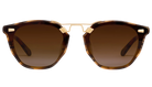 Sunglasses with tortoiseshell frame and brown gradient lenses on a white background