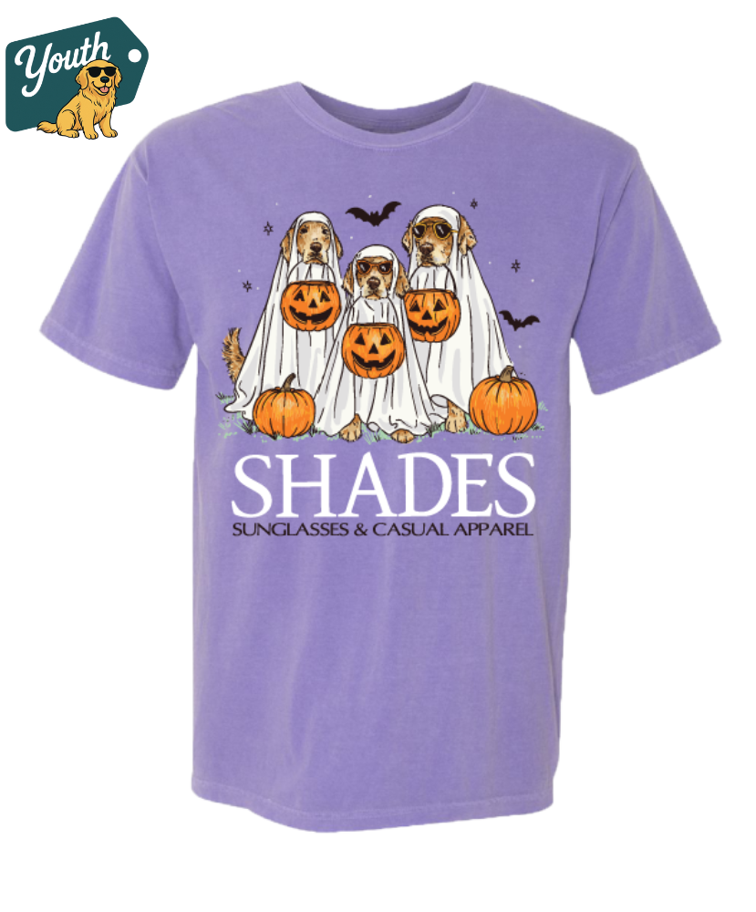 Purple t-shirt with Halloween-themed design of dogs in costumes and pumpkins, brand 'Shades' visible.