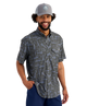 Man wearing a LURES patterned shirt and cap on a white background