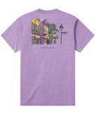 Purple Mardi Gras t-shirt with a colorful graphic of a New Orleans street scene on the back, on a white background.