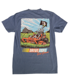 Blue t-shirt with a graphic of a skeleton driving a lawn mower and text 'Drive Fast Eat Grass' on a white background.