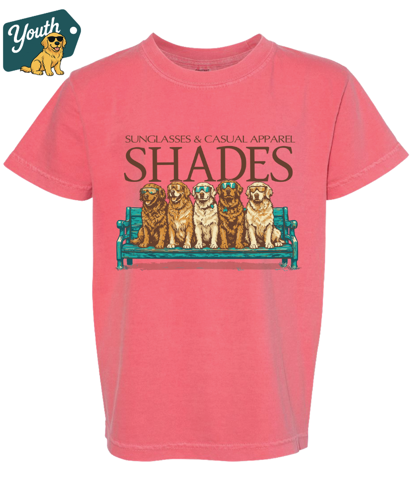 Pink t-shirt with 'SHADES' and dog graphic on a white background
