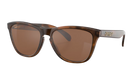 A pair of square-frame sunglasses with a translucent dark brown and amber tortoiseshell acetate frame and warm brown lenses. The brand name 'PETER LIN' is visible in gold lettering on the silver-toned temple arm.