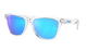 Oakley sunglasses with a clear transparent frame and vibrant blue mirrored lenses, shown on a solid white background.