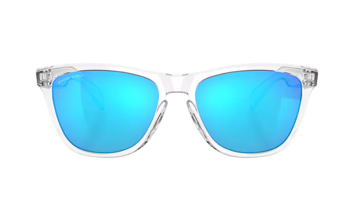 A pair of Oakley Frogskin sunglasses with a clear, semi-transparent frame and vibrant blue mirrored lenses, shown against a solid white background.