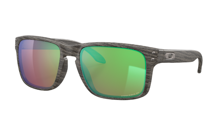 Oakley Sunglasses with green reflective lenses on a white background