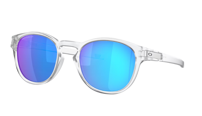 Oakley sunglasses with a translucent clear frame and vibrant mirrored blue and purple lenses, shown on a solid white background.