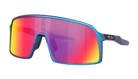 Oakley wraparound sunglasses with a blue frame and a large shield lens featuring a red-to-yellow mirrored gradient.