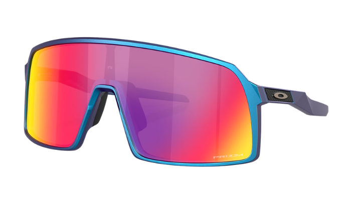 Oakley wraparound sunglasses with a blue frame and a large shield lens featuring a red-to-yellow mirrored gradient.