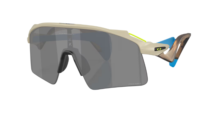 Oakley Stunt Wing Sunglasses with a beige frame and dark lenses on a white background