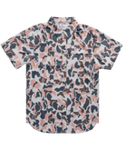 Man wearing a vintage camo patterned short-sleeve button down shirt on a white background