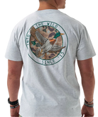 Gray Burlebo t-shirt with a mallard duck graphic and text on the back, worn by a person.
