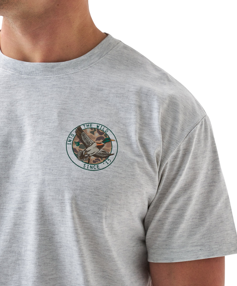 Gray Burlebo t-shirt with a mallard duck graphic and text on the back, worn by a person.