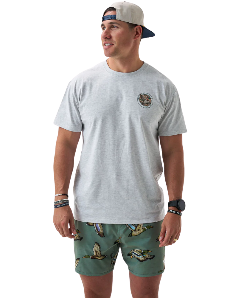 Gray Burlebo t-shirt with a mallard duck graphic and text on the back, worn by a person.
