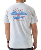 Person wearing a gray USA t-shirt with a patriotic design on the back