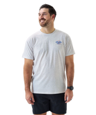 Man wearing a gray t-shirt with a logo on a white background