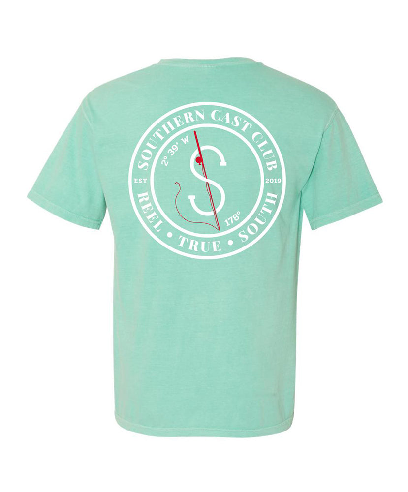 A mint green short-sleeve t-shirt shown from the back, featuring a large white circular graphic with a compass and red line details, and the text 'SOUTHERN CAST CLUB'.
