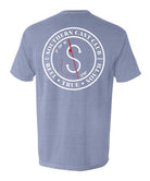 A heathered periwinkle blue short-sleeve t-shirt shown from the back, featuring a large white circular graphic with a red compass design and the text 'SOUTHERN CAST CLUB'.